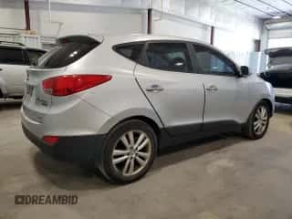 2011 Hyundai Tucson GLS z VIN KM8JUCAC6BU176321, wystawiony jako Copart lot #73951394 z przebiegiem 146 949 mil mil oraz Nie do naprawy • Non repairable. Historia ofert i sprzedaży dostępna na DreamBid. Obrazek 3.