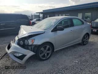 2015 Chevrolet Sonic RS z VIN 1G1JG5SB7F4168806, wystawiony jako Copart lot #59898885 z przebiegiem 86 826 mil mil oraz Szkoda całkowita • Salvage title. Historia ofert i sprzedaży dostępna na DreamBid. Obrazek 1.