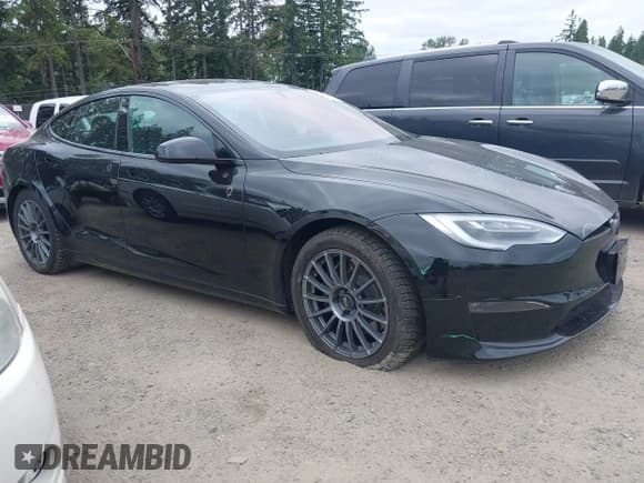 ✅ 2021 Tesla Model S Plaid • VIN: 5YJSA1E62MF447509 • Lot: 42509281. Listed on IAAI with 32,372 mi. Free auction sales archive from the USA and detailed vehicle history report at DreamBid. Image 1.