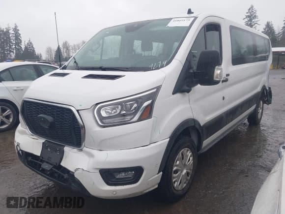 ✅ 2023 Ford Transit Passenger XL • VIN: 1FBAX2Y83PKA49279 • Лот: 41869175. Опубликован ранее на IAAI с пробегом 19 149 миль. Бесплатный доступ к архиву аукционных продаж из США и подробный отчёт об истории автомобиля на DreamBid. Изображение 2.