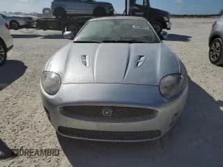 ✅ 2009 Jaguar XK XKR • VIN: SAJWA44C199B29865 • Лот: 73766674. Опубликован ранее на Copart с пробегом Не указан. Бесплатный доступ к архиву аукционных продаж из США и подробный отчёт об истории автомобиля на DreamBid. Изображение 5.