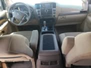 ✅ 2014 Nissan Armada SV • VIN: 5N1AA0NC9EN605130 • Лот: 62556195. Опубликован ранее на Copart с пробегом 137 548 миль. Бесплатный доступ к архиву аукционных продаж из США и подробный отчёт об истории автомобиля на DreamBid. Изображение 8.