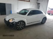 ✅ 2012 Volkswagen Beetle Turbo • VIN: 3VWVA7AT1CM603493 • Lot: 67586885. Listed on Copart with 97,207 mi. Free auction sales archive from the USA and detailed vehicle history report at DreamBid. Image 1.