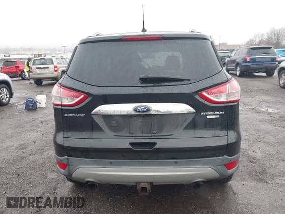 ✅ 2015 Ford Escape Titanium • VIN: 1FMCU9J9XFUB77087 • Lot: 43771373. Listed on IAAI with 95,650 mi. Free auction sales archive from the USA and detailed vehicle history report at DreamBid. Image 16.