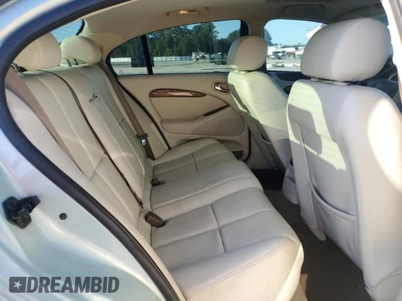 ✅ 2005 Jaguar S-Type • VIN: SAJWA01T65FN18295 • Lot: 73609874. Wystawiony na Copart z przebiegiem 99 826 mil. Bezpłatny archiwum sprzedaży aukcyjnych z USA i szczegółowy raport historii pojazdu na DreamBid. Zdjęcie 10.