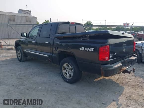 2007 Dodge Dakota SLT with VIN 1D7HW48K97S138512, listed as a IAAI auction lot 42386042 with 146,629 mi miles and . Bid and sale history available at DreamBid. Image 3.
