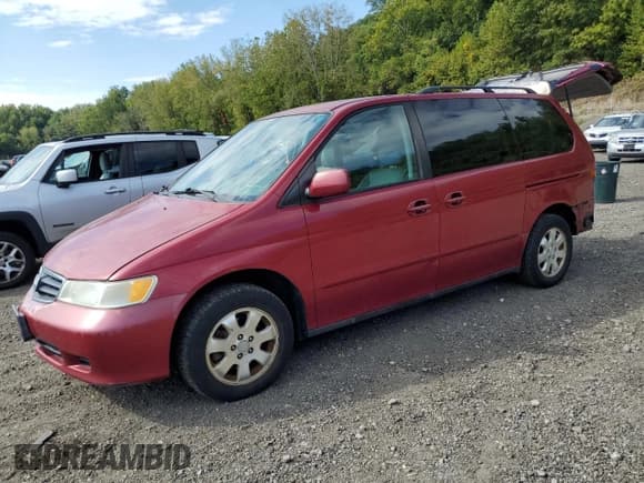 ✅ 2002 Honda Odyssey EX-L • VIN: 2HKRL18972H573670 • Lot: 80297685. Listed on Copart with 186,167 mi. Free auction sales archive from the USA and detailed vehicle history report at DreamBid. Image 1.