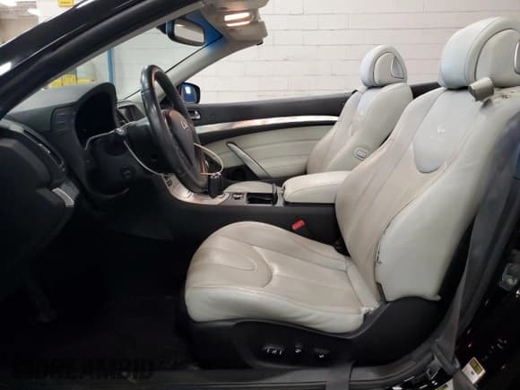 ✅ 2009 Infiniti G37 • VIN: JNKCV66E69M724316 • Lot: 84406895. Listed on Copart with 104,811 mi. Free auction sales archive from the USA and detailed vehicle history report at DreamBid. Image 7.