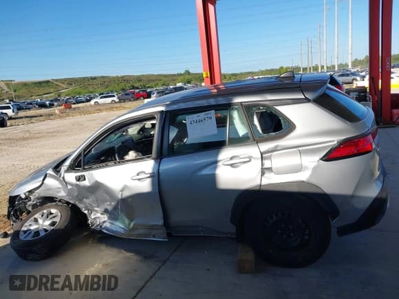 ✅ 2022 Toyota Corolla Cross L • VIN: 7MUAAAAG8NV008439 • Lot: 43446579. Listed on IAAI with Not provided. Free auction sales archive from the USA and detailed vehicle history report at DreamBid. Image 15.