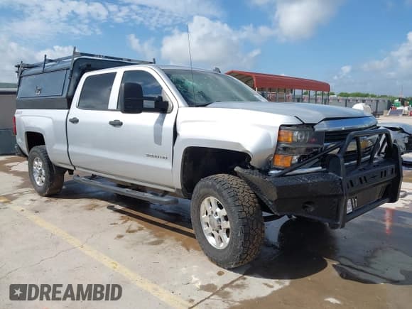 ✅ 2015 Chevrolet Silverado 2500HD LT • VIN: 1GC1KVEG7FF161176 • Lot: 42684231. Listed on IAAI with 242,456 mi. Free auction sales archive from the USA and detailed vehicle history report at DreamBid. Image 1.