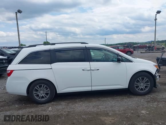 ✅ 2012 Honda Odyssey EX-L • VIN: 5FNRL5H60CB042274 • Lot: 42376811. Listed on IAAI with 169,350 mi. Free auction sales archive from the USA and detailed vehicle history report at DreamBid. Image 13.