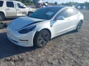 ✅ 2022 Tesla Model 3 • VIN: 5YJ3E1EA3NF329452 • Лот: 43355641. Опубликован ранее на IAAI с пробегом 36 337 миль. Бесплатный доступ к архиву аукционных продаж из США и подробный отчёт об истории автомобиля на DreamBid. Изображение 2.