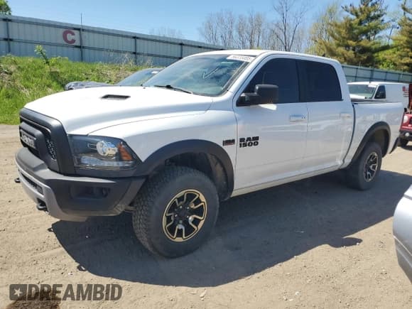 ✅ 2017 Ram 1500 Rebel • VIN: 1C6RR7YT7HS858318 • Lot: 56338085. Listed on Copart with 143,301 mi. Free auction sales archive from the USA and detailed vehicle history report at DreamBid. Image 1.