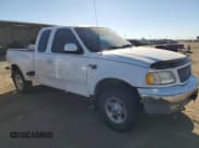 ✅ 1999 Ford F-150 XL • VIN: 1FTRX08L3XKA57809 • Lot: 91516805. Listed on Copart with 204,081 mi. Free auction sales archive from the USA and detailed vehicle history report at DreamBid. Image 4.
