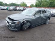 ✅ 2023 Mazda CX-30 S Premium • VIN: 3MVDMBDM9PM570034 • Lot: 42472588. Listed on IAAI with 30,715 mi. Free auction sales archive from the USA and detailed vehicle history report at DreamBid. Image 19.