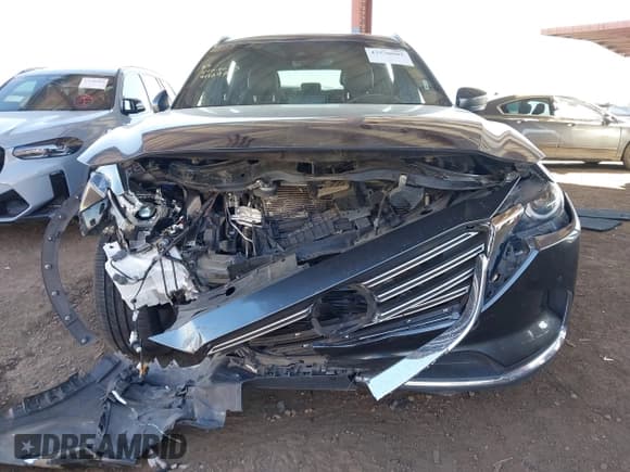 ✅ 2020 Mazda CX-9 Grand Touring • VIN: JM3TCADY0L0412697 • Lot: 43570985. Listed on IAAI with 59,725 mi. Free auction sales archive from the USA and detailed vehicle history report at DreamBid. Image 12.