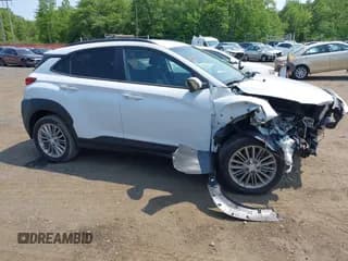 ✅ 2021 Hyundai Kona SEL • VIN: KM8K2CAA9MU615281 • Лот: 42403332. Опубликован ранее на IAAI с пробегом 57 206 миль. Бесплатный доступ к архиву аукционных продаж из США и подробный отчёт об истории автомобиля на DreamBid. Изображение 1.