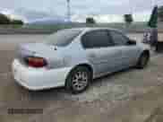 1998 Chevrolet Malibu LS z VIN 1G1NE52M6WY121140, wystawiony jako Copart lot #45587894 z przebiegiem 278 488 mil mil oraz Czysty tytuł • Clean title. Historia ofert i sprzedaży dostępna na DreamBid. Obrazek 3.