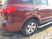 ✅ 2009 Hyundai Santa Fe GLS • VIN: 5NMSG13D09H266334 • Lot: 43521049. Listed on IAAI with 106,637 mi. Free auction sales archive from the USA and detailed vehicle history report at DreamBid. Image 13.