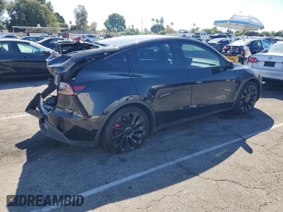 ✅ 2022 Tesla Model Y Performance • VIN: 7SAYGDEF7NF351535 • Lot: 82215665. Listed on Copart with 45,725 mi. Free auction sales archive from the USA and detailed vehicle history report at DreamBid. Image 3.