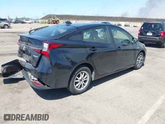 ✅ 2021 Toyota Prius LE • VIN: JTDL9MFUXM3024282 • Lot: 42304474. Listed on IAAI with 67,019 mi. Free auction sales archive from the USA and detailed vehicle history report at DreamBid. Image 4.