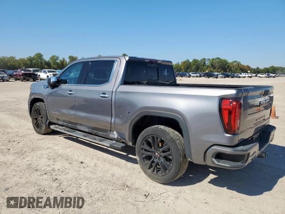 ✅ 2021 GMC Sierra 1500 Denali • VIN: 3GTU9FET8MG337899 • Лот: 89870085. Опубликован ранее на Copart с пробегом Не указан. Бесплатный доступ к архиву аукционных продаж из США и подробный отчёт об истории автомобиля на DreamBid. Изображение 2.