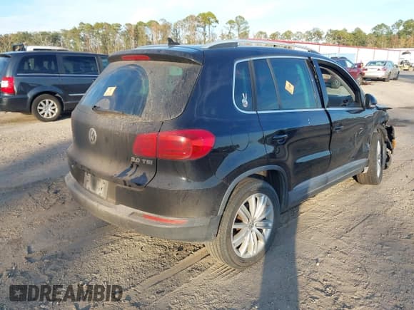 ✅ 2013 Volkswagen Tiguan S • VIN: WVGAV3AXXDW623871 • Lot: 43762873. Listed on IAAI with 145,094 mi. Free auction sales archive from the USA and detailed vehicle history report at DreamBid. Image 4.