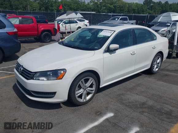 ✅ 2014 Volkswagen Passat SE • VIN: 1VWBS7A35EC088504 • Лот: 42312048. Опубликован ранее на IAAI с пробегом 98 057 миль. Бесплатный доступ к архиву аукционных продаж из США и подробный отчёт об истории автомобиля на DreamBid. Изображение 17.