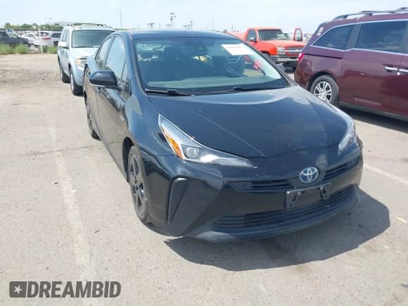 2021 Toyota Prius L Eco with VIN JTDKAMFU0M3138018, listed as a IAAI auction lot 43009082 with 153,830 mi miles and . Bid and sale history available at DreamBid. Image 1.
