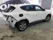 2024 Dodge Hornet R/T z VIN ZACPDFCW1R3A29978, wystawiony jako Copart lot #56465575 z przebiegiem 31 714 mil mil oraz Nie do naprawy • Non repairable. Historia ofert i sprzedaży dostępna na DreamBid. Obrazek 3.