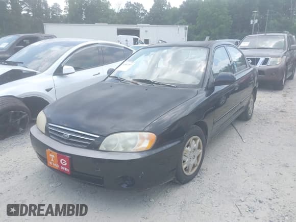✅ 2003 Kia Spectra • VIN: KNAFB121535246949 • Lot: 42402307. Listed on IAAI with 98,678 mi. Free auction sales archive from the USA and detailed vehicle history report at DreamBid. Image 2.