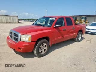 ✅ 2005 Dodge Dakota SLT • VIN: 1D7HE48K15S330989 • Лот: 61788145. Опубликован ранее на Copart с пробегом 248 984 миль. Бесплатный доступ к архиву аукционных продаж из США и подробный отчёт об истории автомобиля на DreamBid. Изображение 1.