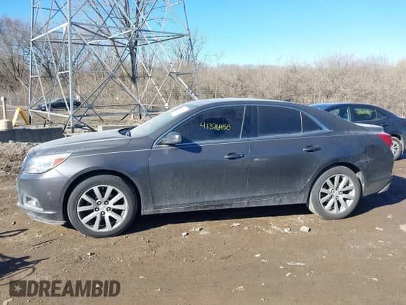 2013 Chevrolet Malibu LT z VIN 1G11E5SA4DF255089, wystawiony jako IAAI lot #41376450 z przebiegiem 159 824 mil mil oraz . Historia ofert i sprzedaży dostępna na DreamBid. Obrazek 14.