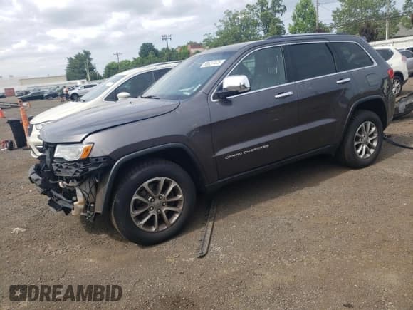 ✅ 2015 Jeep Grand Cherokee Limited • VIN: 1C4RJFBG6FC205900 • Лот: 60627475. Опубликован ранее на Copart с пробегом 164 482 миль. Бесплатный доступ к архиву аукционных продаж из США и подробный отчёт об истории автомобиля на DreamBid. Изображение 1.
