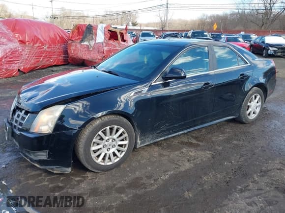 ✅ 2012 Cadillac CTS • VIN: 1G6DC5E5XC0144060 • Lot: 41596919. Listed on IAAI with 108,151 mi. Free auction sales archive from the USA and detailed vehicle history report at DreamBid. Image 2.