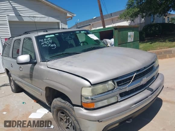 ✅ 2004 Chevrolet Suburban LT • VIN: 1GNFK16Z24J154314 • Lot: 42462404. Listed on IAAI with 275,938 mi. Free auction sales archive from the USA and detailed vehicle history report at DreamBid. Image 1.