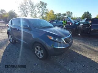 ✅ 2012 Kia Sportage LX • VIN: KNDPB3A25C7285011 • Lot: 43405600. Listed on IAAI with 209,225 mi. Free auction sales archive from the USA and detailed vehicle history report at DreamBid. Image 1.