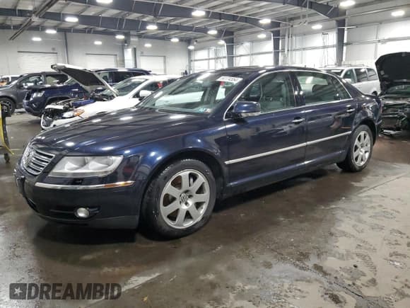 ✅ 2004 Volkswagen Phaeton V8 • VIN: WVWAF63D148009799 • Лот: 84174554. Опубликован ранее на Copart с пробегом 130 548 миль. Бесплатный доступ к архиву аукционных продаж из США и подробный отчёт об истории автомобиля на DreamBid. Изображение 1.