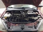 ✅ 2003 Ford Focus SE • VIN: 1FAFP34Z83W231672 • Lot: 42322702. Listed on IAAI with 173,625 mi. Free auction sales archive from the USA and detailed vehicle history report at DreamBid. Image 10.