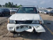 ✅ 2002 Isuzu Rodeo S • VIN: 4S2CK58W524321108 • Lot: 42352330. Listed on IAAI with 270,614 mi. Free auction sales archive from the USA and detailed vehicle history report at DreamBid. Image 6.