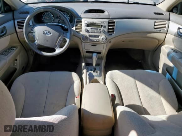 ✅ 2007 Kia Optima EX • VIN: KNAGE124X75108285 • Lot: 55931085. Wystawiony na Copart z przebiegiem 58 758 mil. Bezpłatny archiwum sprzedaży aukcyjnych z USA i szczegółowy raport historii pojazdu na DreamBid. Zdjęcie 8.