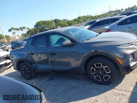 2022 Hyundai Santa Cruz SE with VIN 5NTJA4AE1NH008896, listed as a IAAI auction lot 41444400 with 23,547 mi miles and . Bid and sale history available at DreamBid. Image 13.