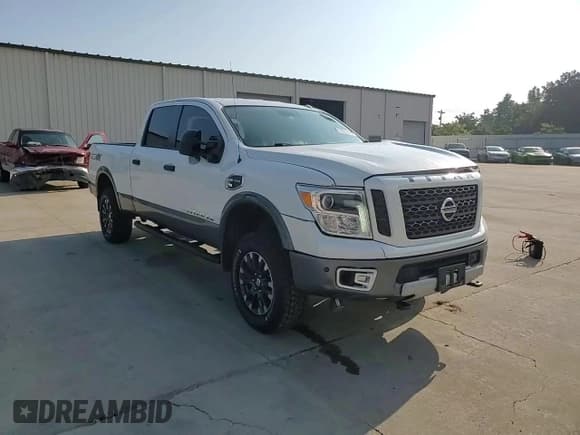 ✅ 2018 Nissan Titan Pro-4X • VIN: 1N6BA1F41JN520957 • Lot: 68283595. Wystawiony na Copart z przebiegiem 115 799 mil. Bezpłatny archiwum sprzedaży aukcyjnych z USA i szczegółowy raport historii pojazdu na DreamBid. Zdjęcie 13.