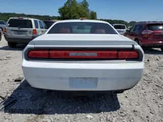 2013 Dodge Challenger SXT z VIN 2C3CDYAG8DH515751, wystawiony jako Copart lot #63542554 z przebiegiem 171 894 mil mil oraz Szkoda całkowita • Salvage title. Historia ofert i sprzedaży dostępna na DreamBid. Obrazek 6.
