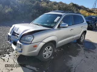 2007 Hyundai Tucson SE with VIN KM8JN72D07U606685, listed as a Copart auction lot 87243795 with 158,114 mi miles and Salvage title. Bid and sale history available at DreamBid. Image 1.