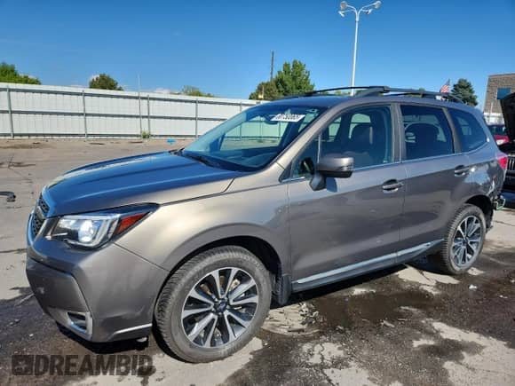 2018 Subaru Forester Touring z VIN JF2SJGWC8JH511119, wystawiony jako Copart lot #80750065 z przebiegiem 86 471 mil mil oraz Szkoda całkowita • Salvage title. Historia ofert i sprzedaży dostępna na DreamBid. Obrazek 1.