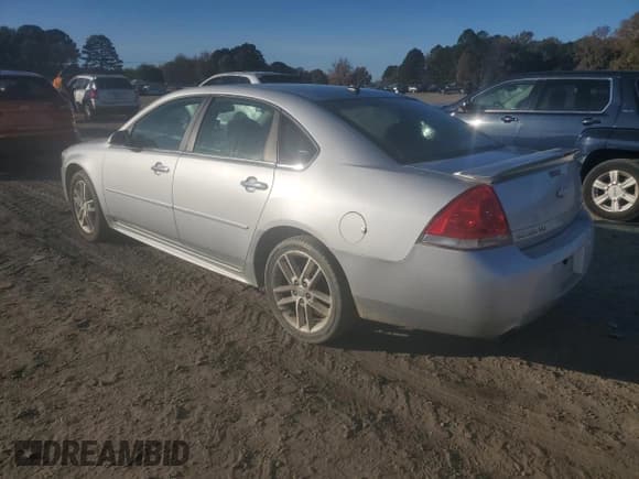 ✅ 2014 Chevrolet Impala LTZ • VIN: 2G1WC5E38E1164683 • Lot: 92457535. Listed on Copart with 250,186 mi. Free auction sales archive from the USA and detailed vehicle history report at DreamBid. Image 2.
