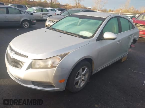 ✅ 2014 Chevrolet Cruze 1LT • VIN: 1G1PC5SB7E7219031 • Lot: 43581337. Listed on IAAI with 150,660 mi. Free auction sales archive from the USA and detailed vehicle history report at DreamBid. Image 2.