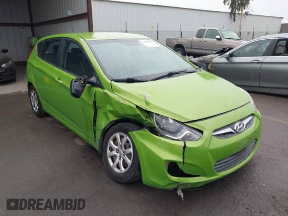 2014 Hyundai Accent GS z VIN KMHCT5AE5EU170717, wystawiony jako IAAI lot #43089589 z przebiegiem 109 181 mil mil oraz . Historia ofert i sprzedaży dostępna na DreamBid. Obrazek 6.