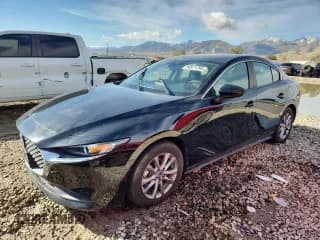 ✅ 2021 Mazda 3 S • VIN: JM1BPAAL9M1323756 • Lot: 86971295. Listed on Copart with Not provided. Free auction sales archive from the USA and detailed vehicle history report at DreamBid. Image 1.